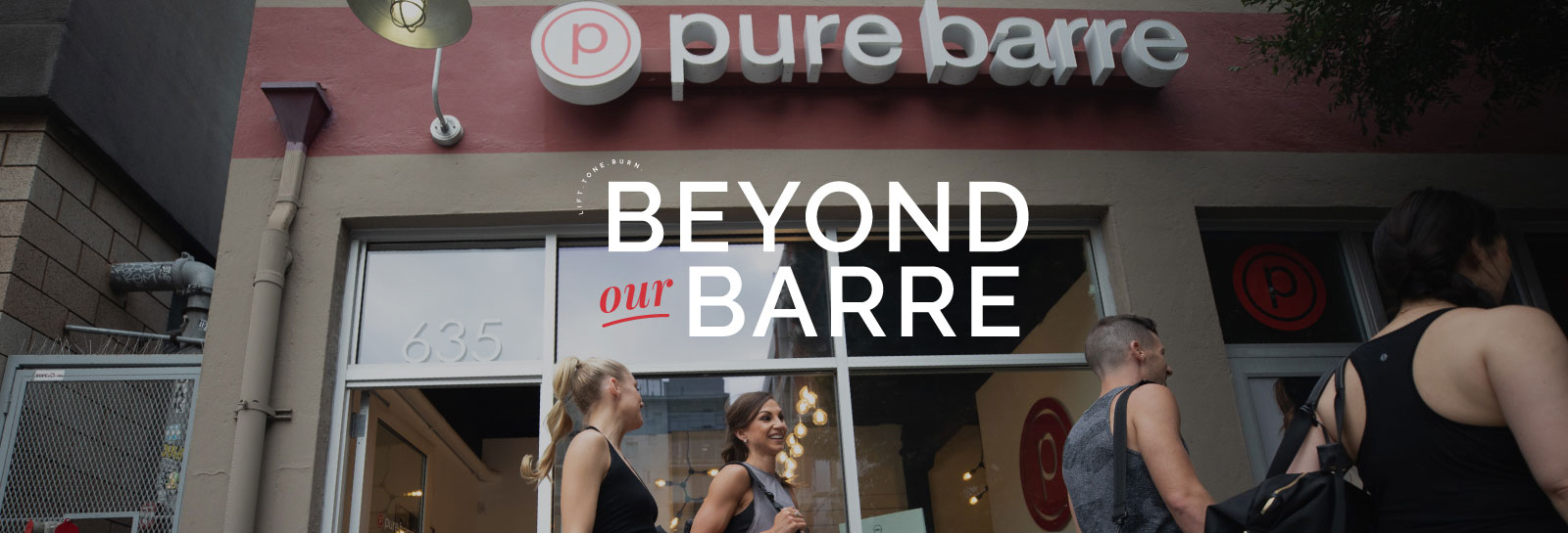 Group standing outside of the Pure Barre building